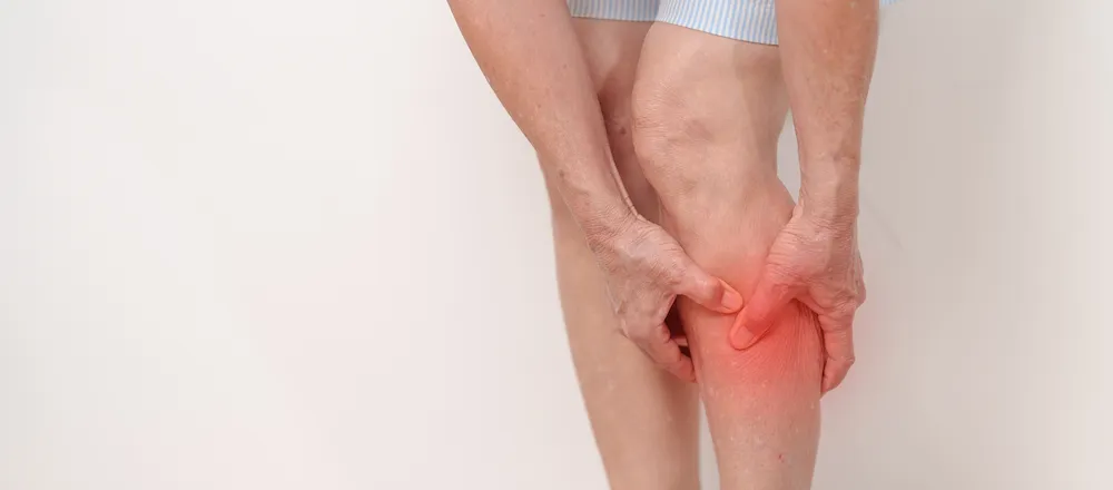 Image of an elderly experiencing calf pain